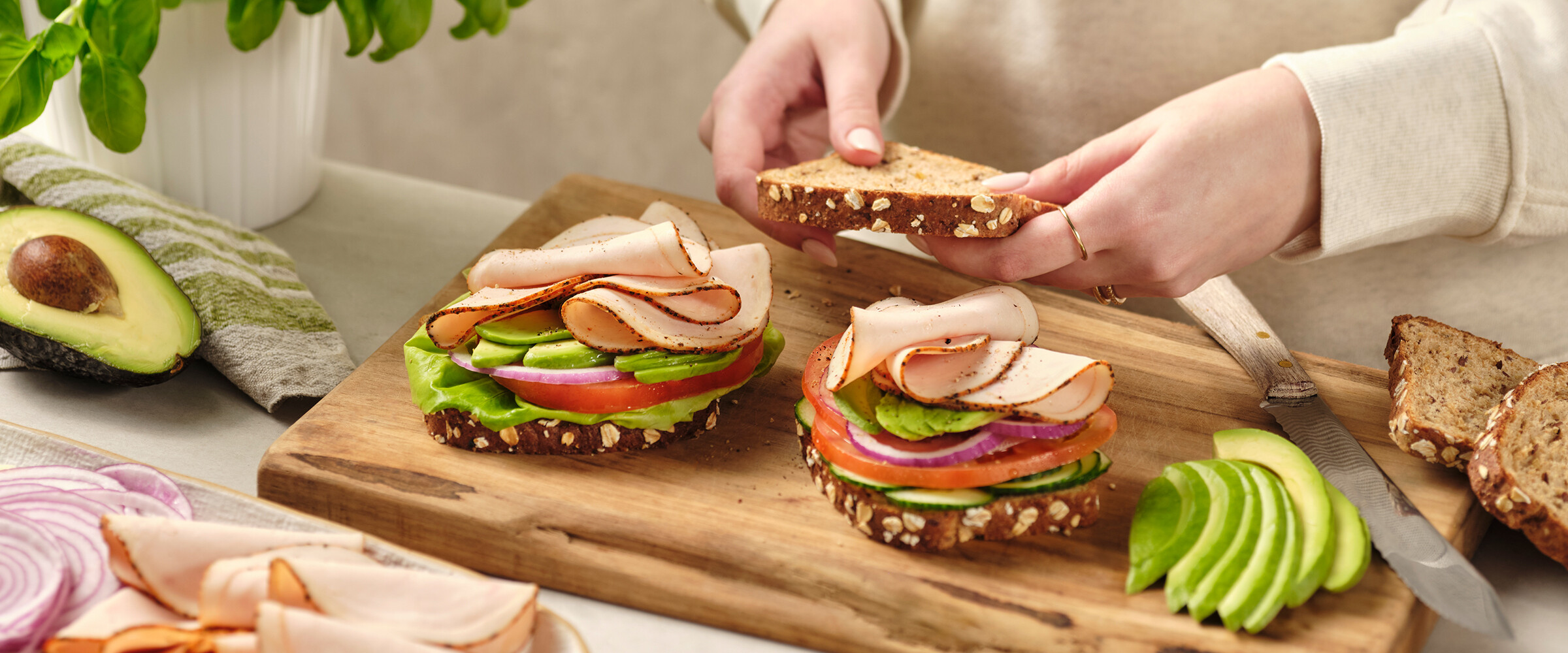 Close-up of sliced meat in a sandwich.