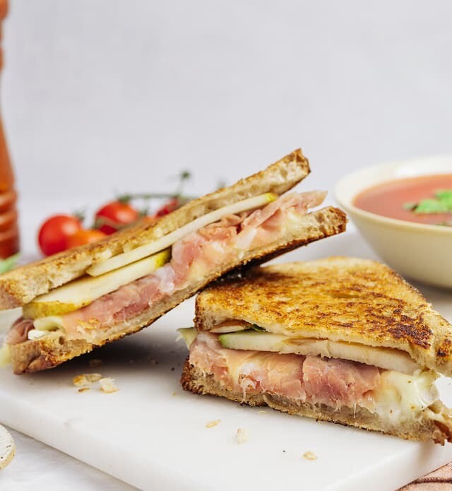 A close-up of a Prosciutto, Pear & Swiss Grilled Sandwich.