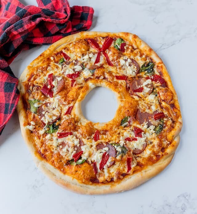 Pizza Wreath displayed on a white plate.