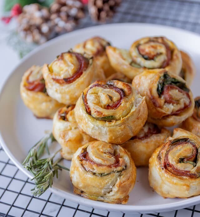 Close-up of ham and crescent roll dough pinwheel