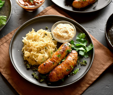 Organic deli meat dish with farmer sausage and sauerkraut